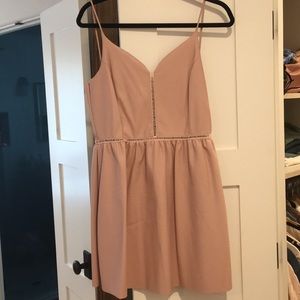 Nude color faux leather dress.